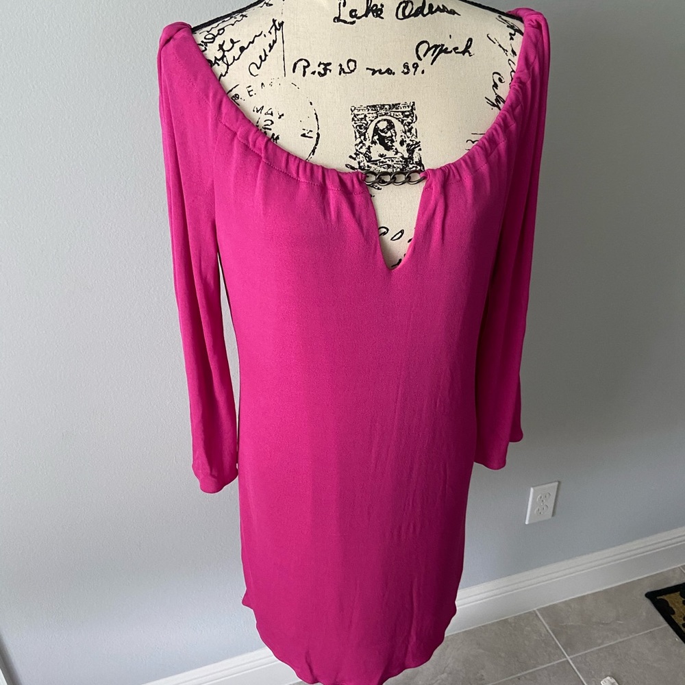 Off shoulder , 60s style dress .